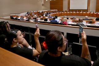 Long Beach, CA - California State University students with the grassroots group Students for Quality Education attend a meeting of the CSU Board of Trsutees in Long Beach on Tuesday, July 11, 2023. July 11: in Long Beach on Tuesday, July 11, 2023 in Long Beach, CA. (Luis Sinco / Los Angeles Times)