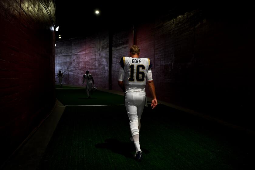 LOS ANGELES, CALIFORNIA SEPTEMBER 29, 2019-Rams quarterback Jared Goff walks through the tunnel after warm-ups before a game with the Bucaneers at the Coliseum.(Wally Skalij/Los Angeles Times)