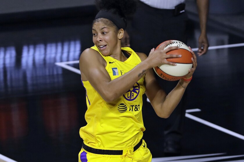 Sparks forward Candace Parker pulls down a rebound.
