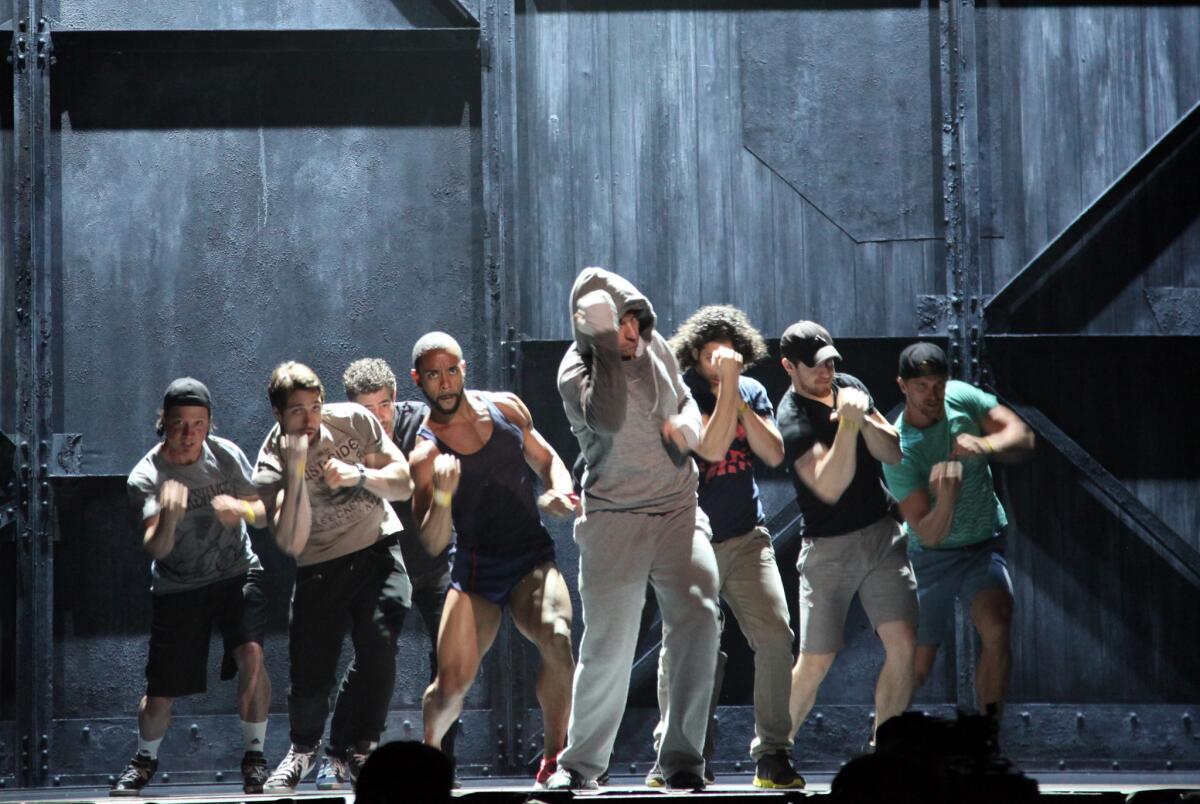 Andy Karl, center, performing with the cast of "Rocky," during a rehearsal for the Tony Awards at Radio City Music Hall in June.