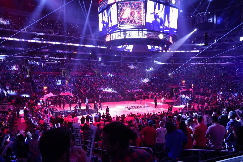 Teams are introduced prior to Game 3 of the NBA basketball Western Conference Finals between the Los Angeles Clippers and the Phoenix Suns Thursday, June 24, 2021, in Los Angeles. (AP Photo/Mark J. Terrill)
