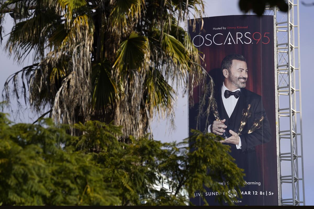 An advertisement for Sunday's 95th Academy Awards features host Jimmy Kimmel, Wednesday, March 8, 2023, near the Dolby Theatre in Los Angeles. (AP Photo/Chris Pizzello)