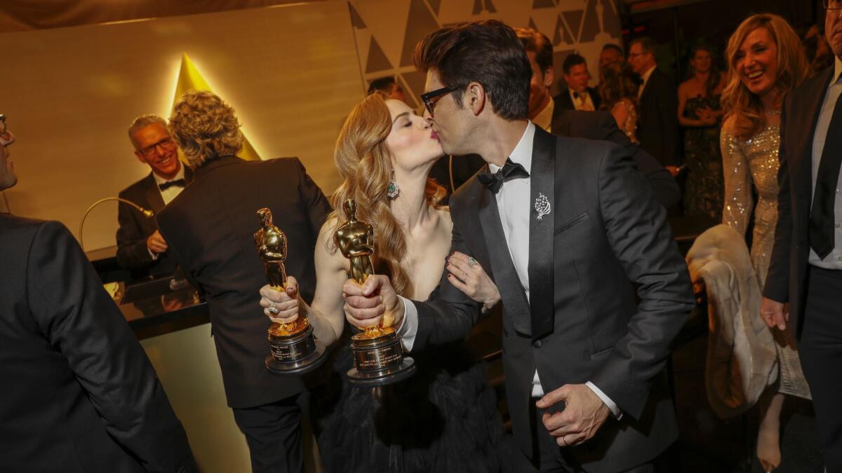 Married Oscar winners for "Skin" Jaime Ray Newman, who was a producer, and Guy Nattiv, who produced, directed and co-wrote.