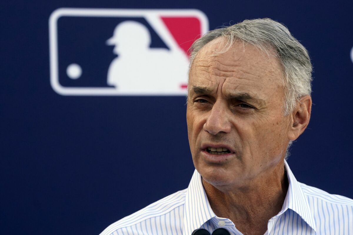 MLB Commissioner Rob Manfred speaks Tuesday in Jupiter, Fla., during a news conference.