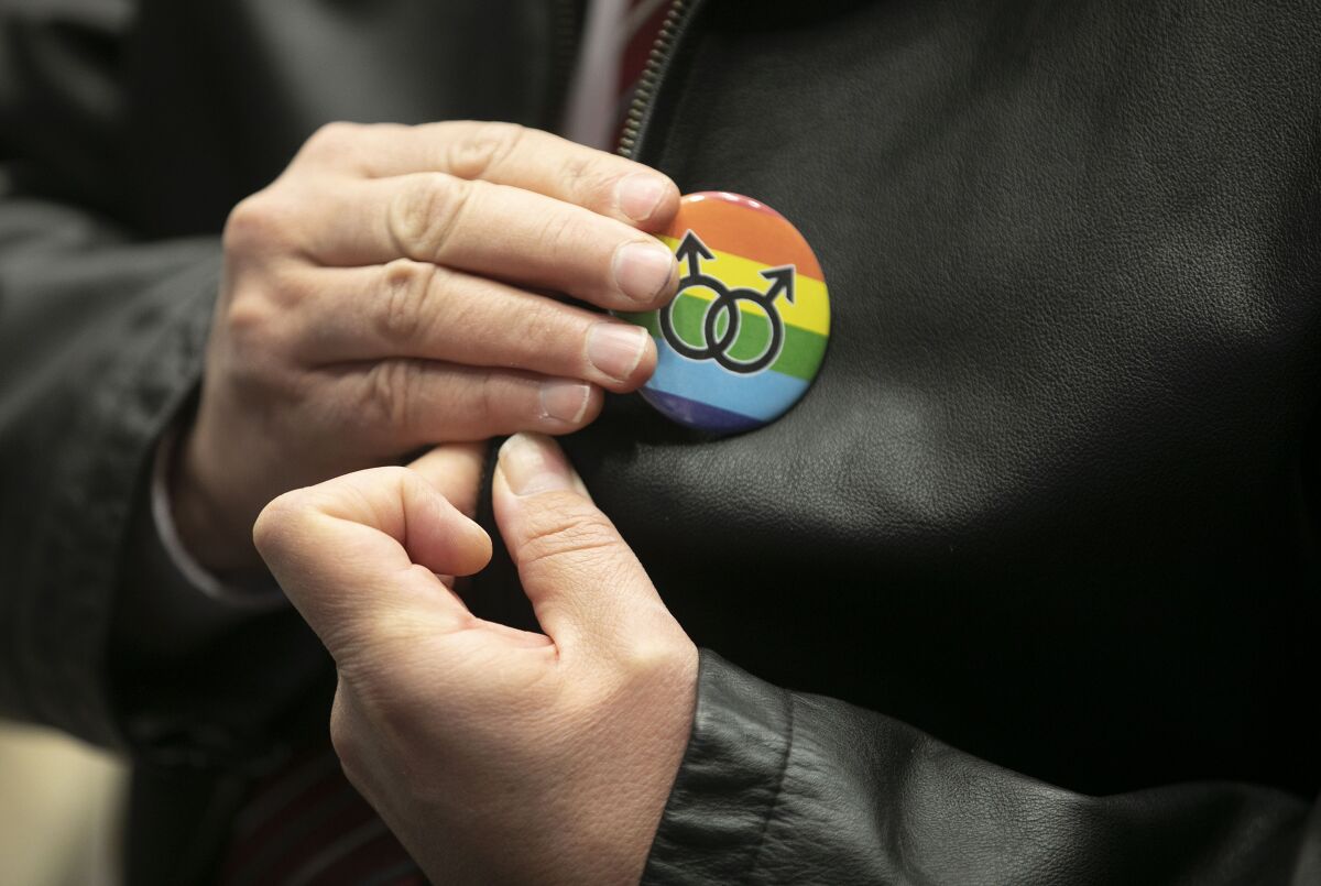 A same-sex marriage button 
