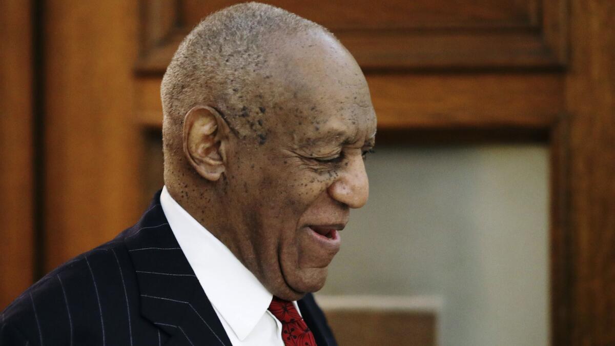 Bill Cosby leaves court Friday in Norristown, Pa.