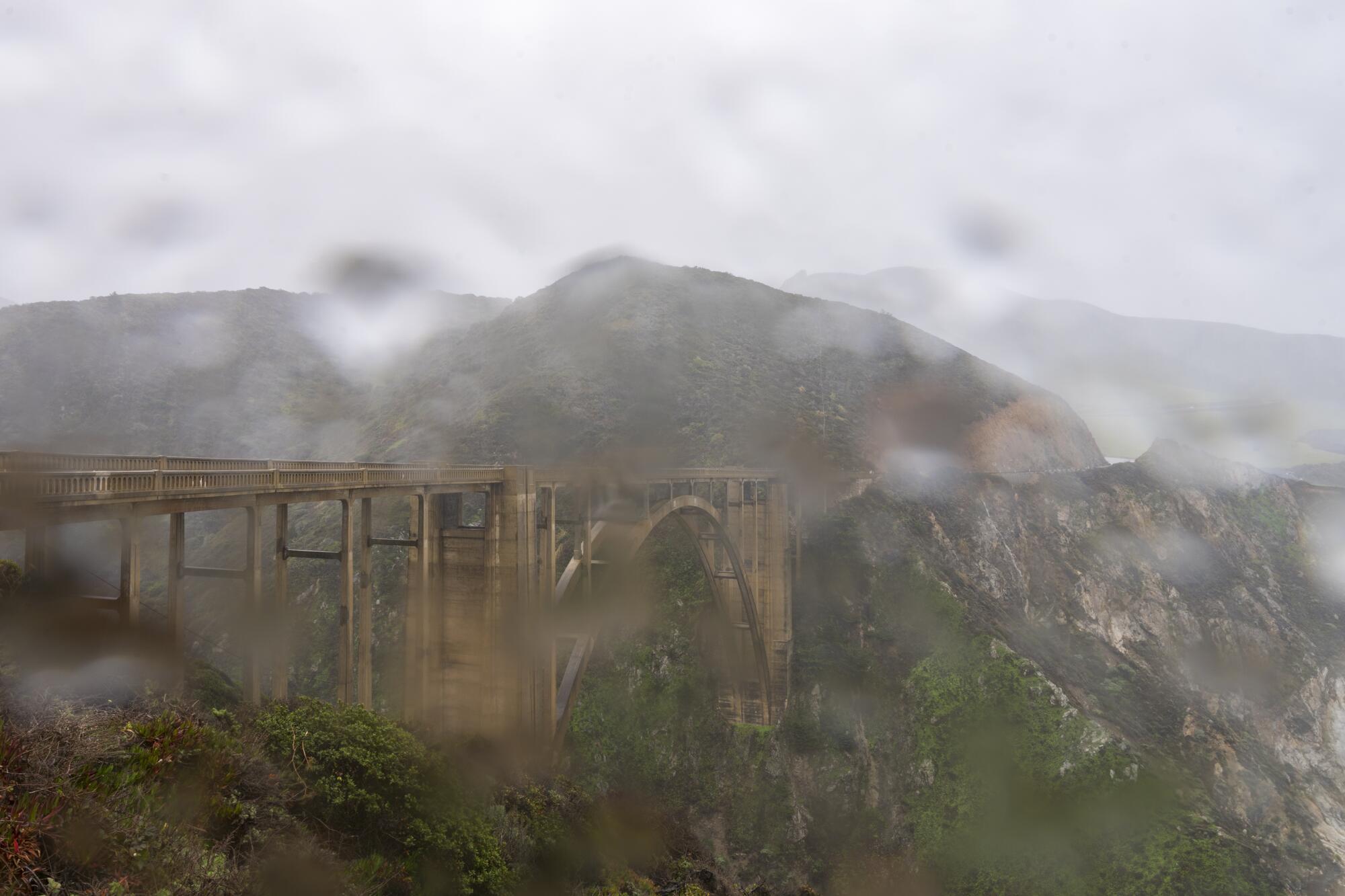 Heavy rain falls over Bixby Bridge along Highway 1 near Big Sur.