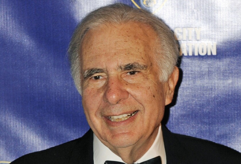 Financier Carl Icahn is pressuring Apple to buy back stock for a second time.