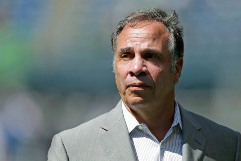 Coach Bruce Arena is being followed to the U.S. national team by four Galaxy assistants.