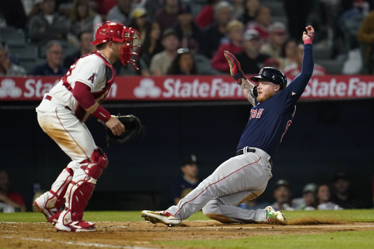 Boston Red Sox's Alex Verdugo scores off of a single hit by Bobby Dalbec.