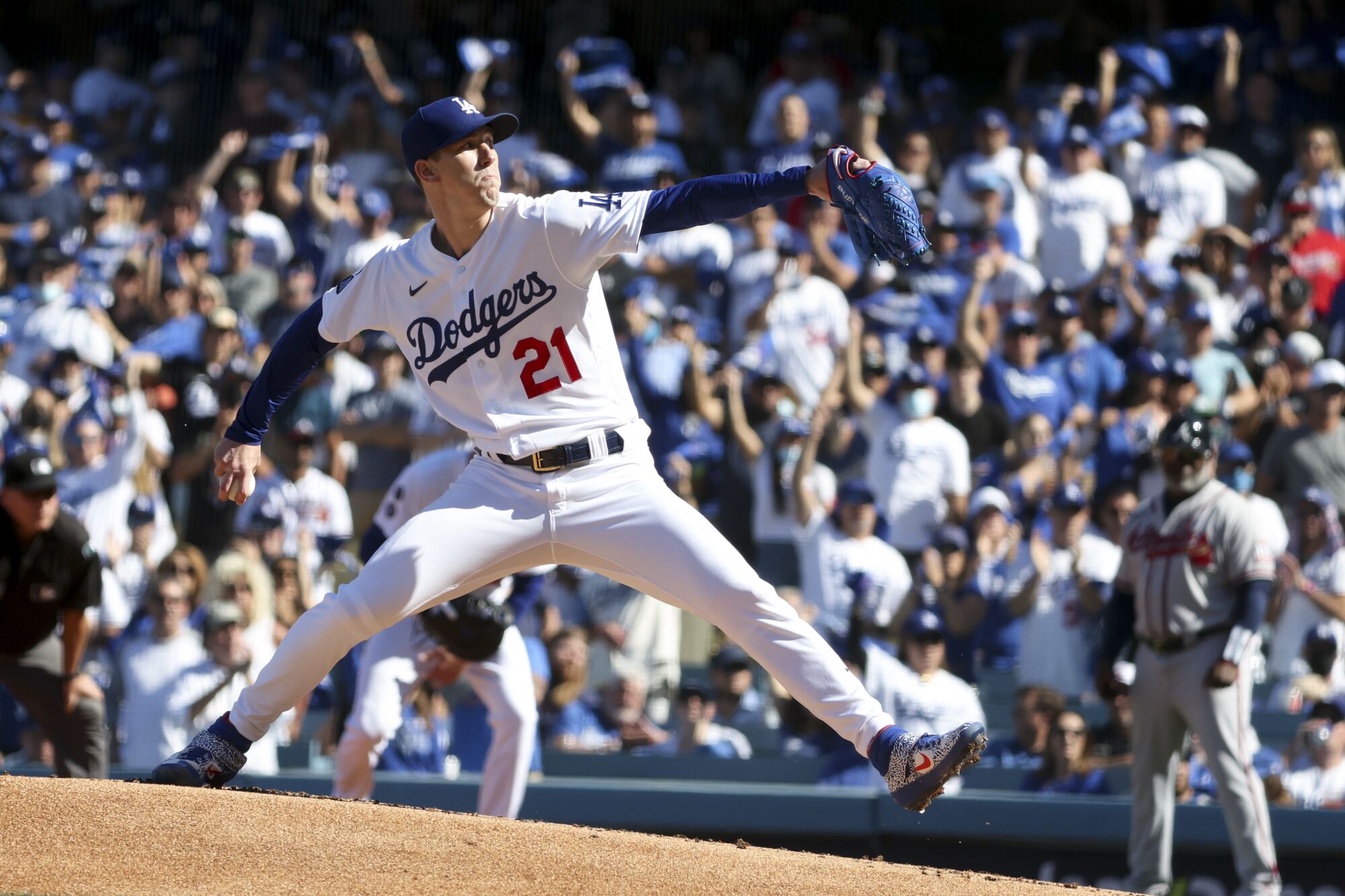 Dodgers starting pitcher Walker Buehler delivers a pitch during the first inning.