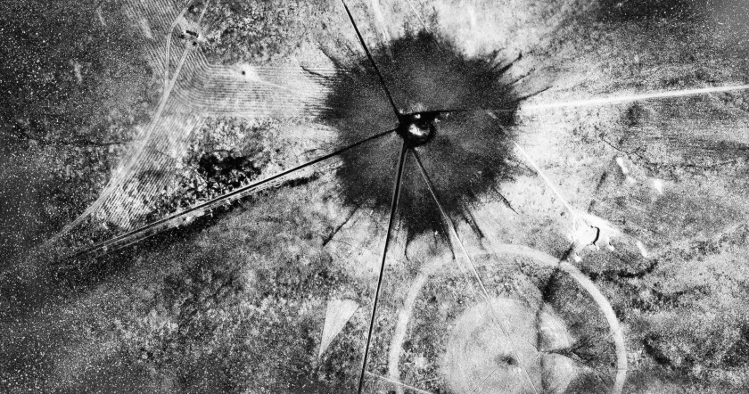 A photo taken July 16, 1945 shows an aerial view after the first atomic explosion at the Trinity Test site in New Mexico.