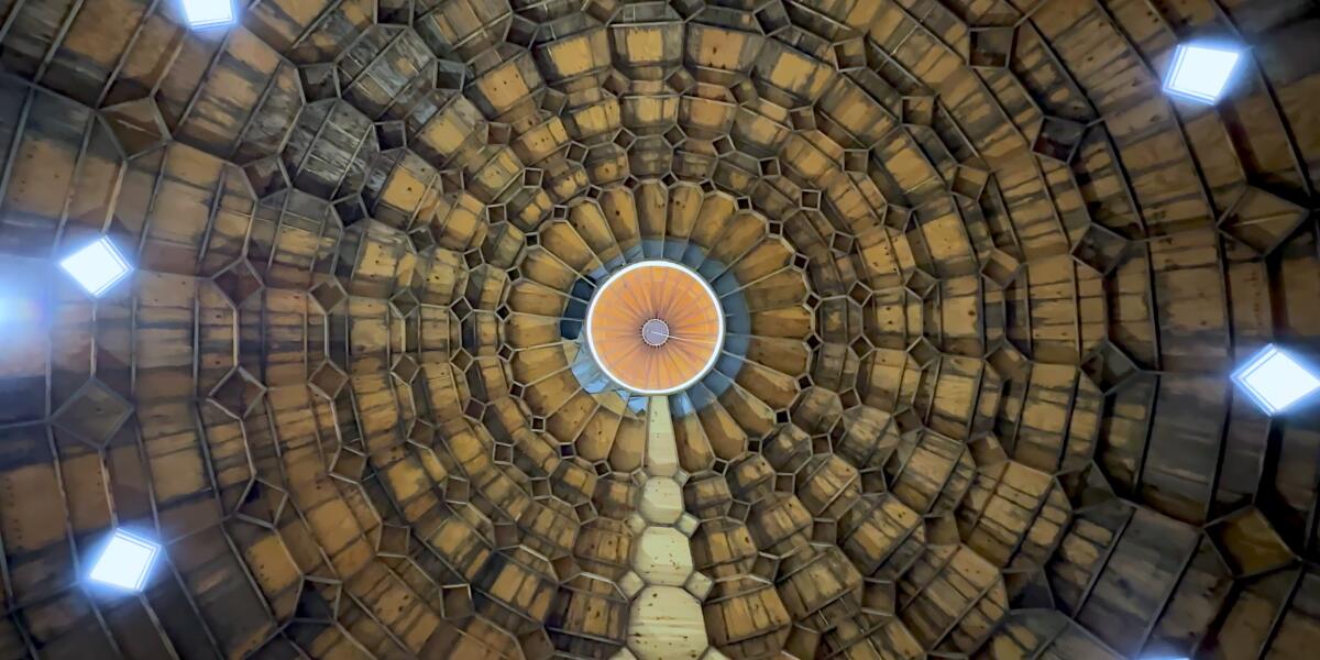 A view of the interlocking octagon- and diamond-shaped wood that make up the interior of a dome