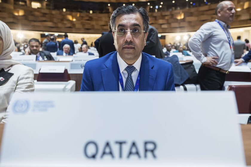 Qatari Minister of Labour, Ali bin Samikh Al Marri, chair of the 111th session of the International Labour Conference, is pictured during the opening session in Geneva, Switzerland, Monday, June 5, 2023. The labor minister of Qatar, which faced intense scrutiny over its treatment of migrant workers in the run-up to last year's soccer World Cup, was elected on Monday as the president of the United Nations labor agency's annual conference. (Pierre Albouy/Keystone via AP)