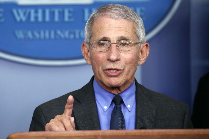 FILE - In this April 7, 2020, file photo, Dr. Anthony Fauci, director of the National Institute of Allergy and Infectious Diseases, speaks about the coronavirus in Washington. With New York City at the epicenter of the coronavirus outbreak in the U.S. and its native-born among those offering crucial information to the nation in televised briefings, the New York accent has stepped up to the mic. Fauci's science-based way of explaining the crisis at White House briefings has attracted untold numbers of fans, and New York Gov. Andrew Cuomo's news conferences have become must-see TV. (AP Photo/Alex Brandon, File)