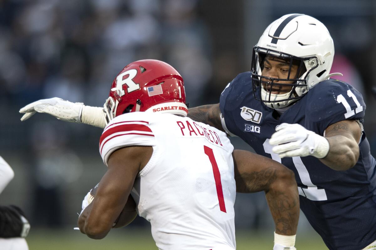 Penn State linebacker Micah Parsons tackles Rutgers running back Isaih Pacheco.