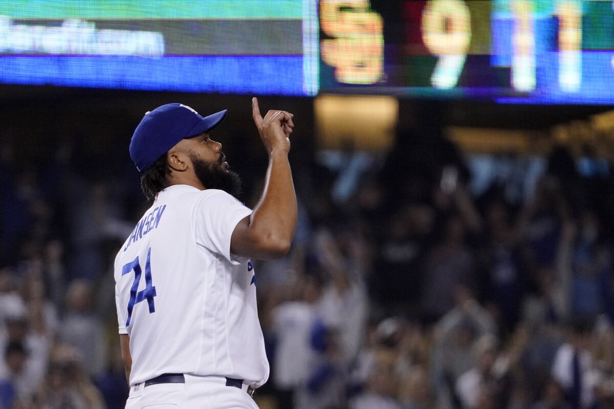 Dodgers relief pitcher Kenley Jansen gestures after a win over the San Diego Padres on Sept. 29.