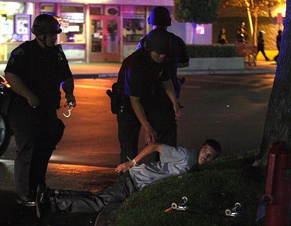 Anaheim protester handcuffed