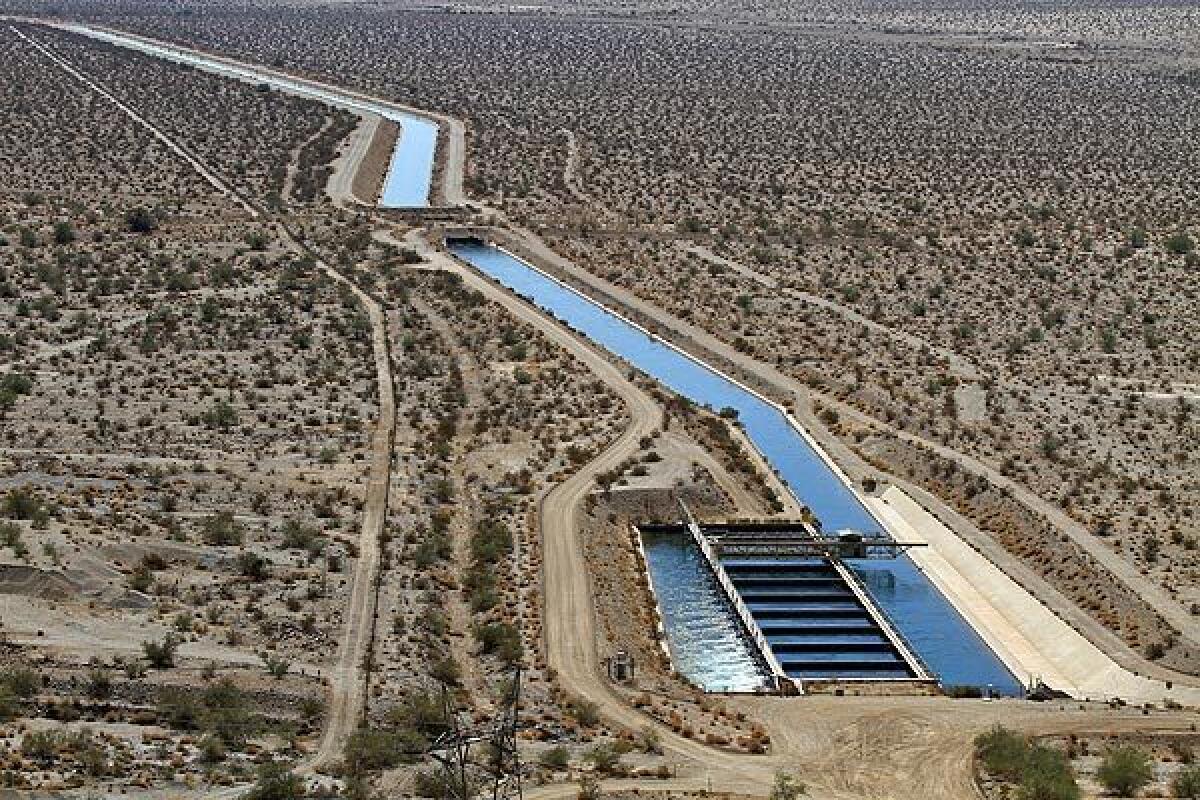 Water from the Colorado River flows through a sand trap.