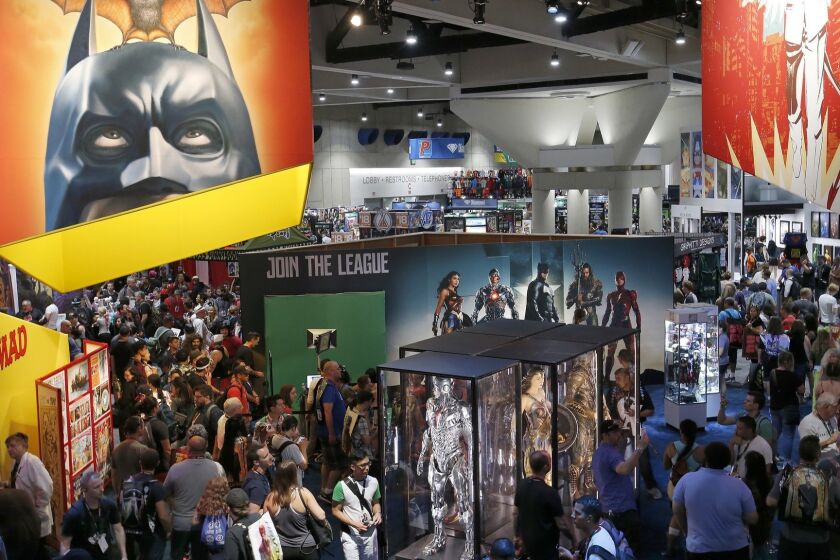 SAN DIEGO, CALIF. -- FRIDAY, JULY 21, 2017: A crowd walks through the DC Comics booth at Comic-Con International 2017 at the San Diego Convention Center in San Diego, Calif., on July 21, 2017. (Allen J. Schaben / Los Angeles Times)