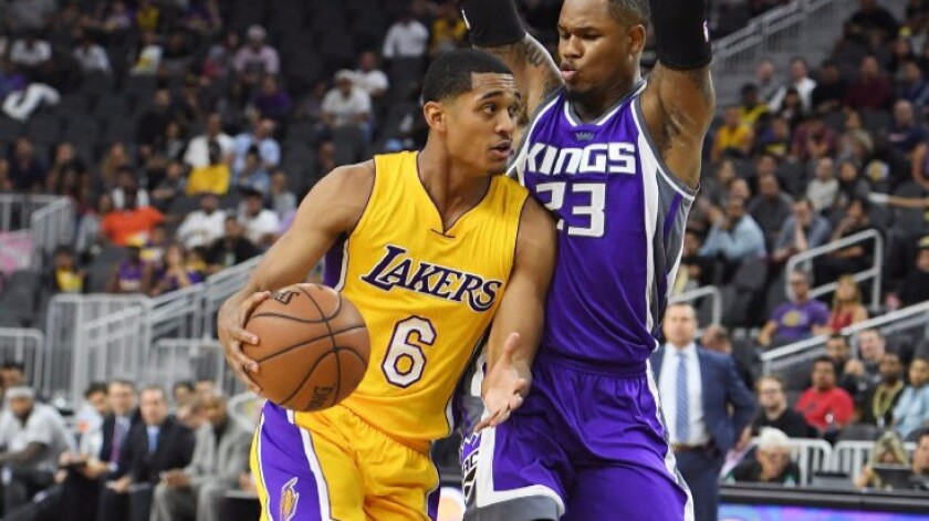 Lakers guard Jordan Clarkson drives against Sacramento's Ben McLemore during a game in Las Vegas on Thursday.