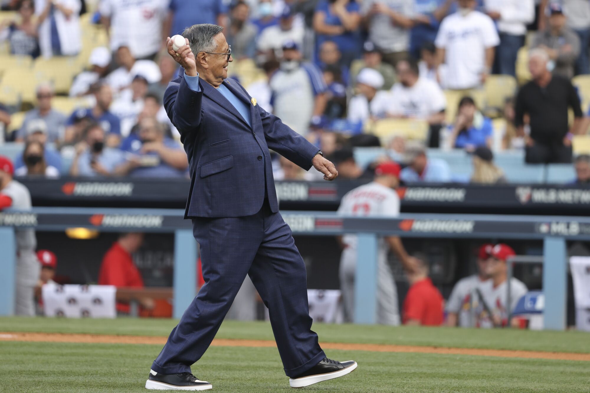 The Spanish language voice of the Los Angeles Dodgers Jaime Jarrin delivers the first pitch before the game