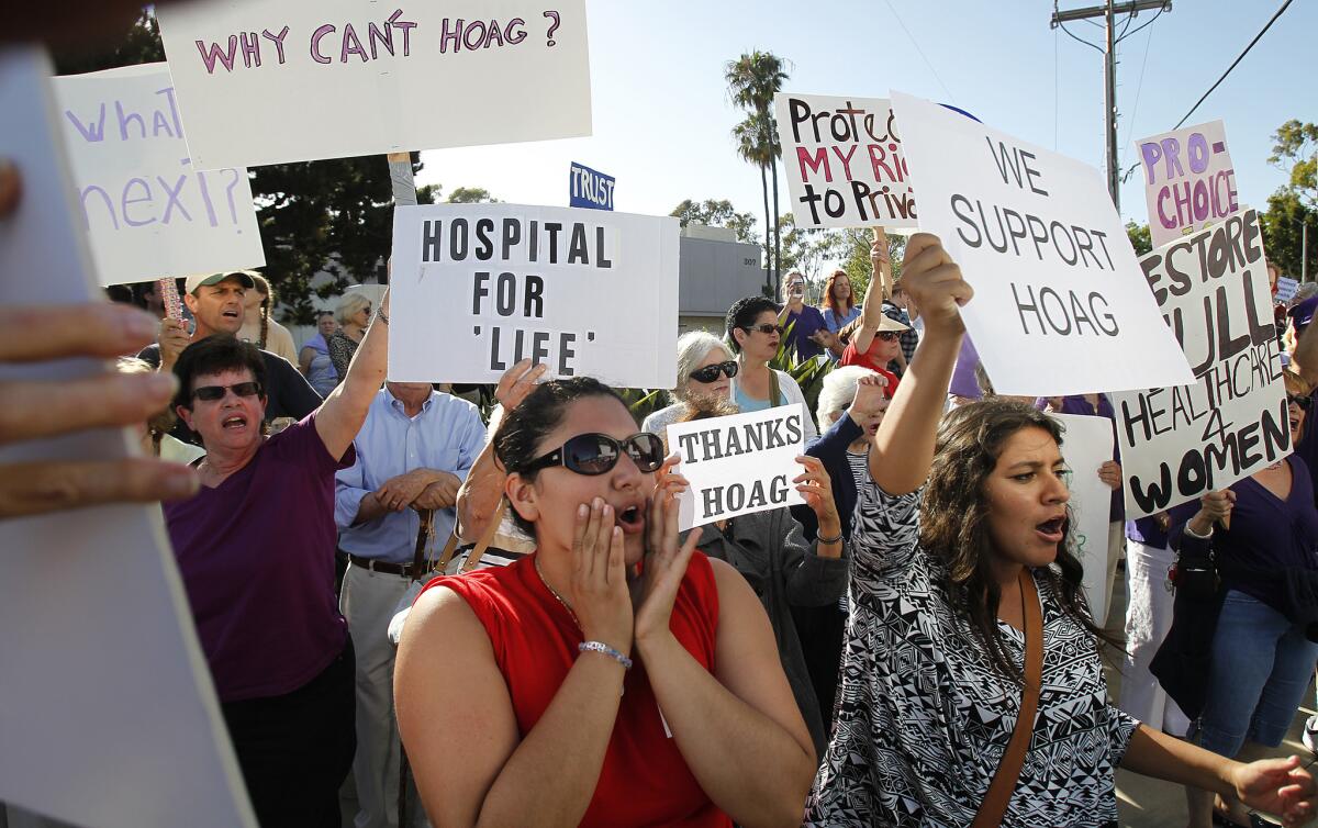 Demonstrators gathered outside Hoag Memorial Hospital in Newport Beach in 2013, after it banned abortions at the behest of its Catholic hospital partners.