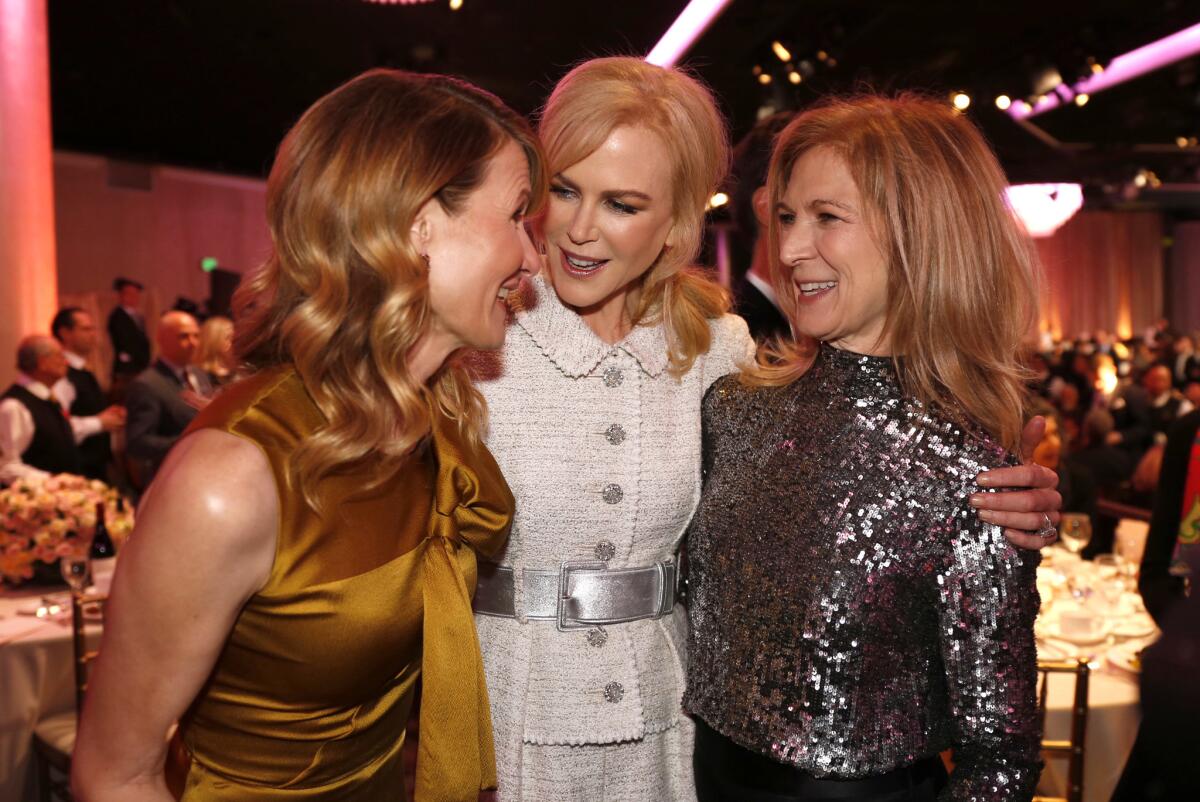 Laura Dern, Nicole Kidman and Dawn Hudson talking at the 2017 Oscar nominees luncheon