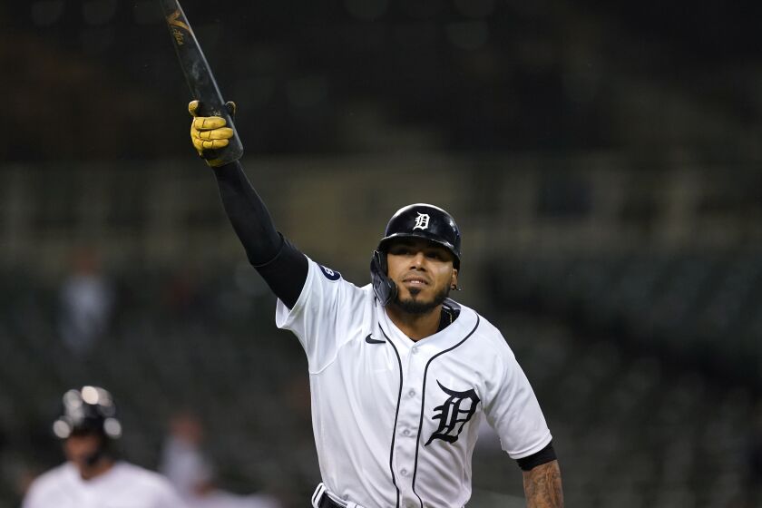 Detroit Tigers' Harold Castro celebrates hitting the game winning single against the Kansas City Royals in the 10th inning of a baseball game in Detroit, Tuesday, Sept. 27, 2022. (AP Photo/Paul Sancya)