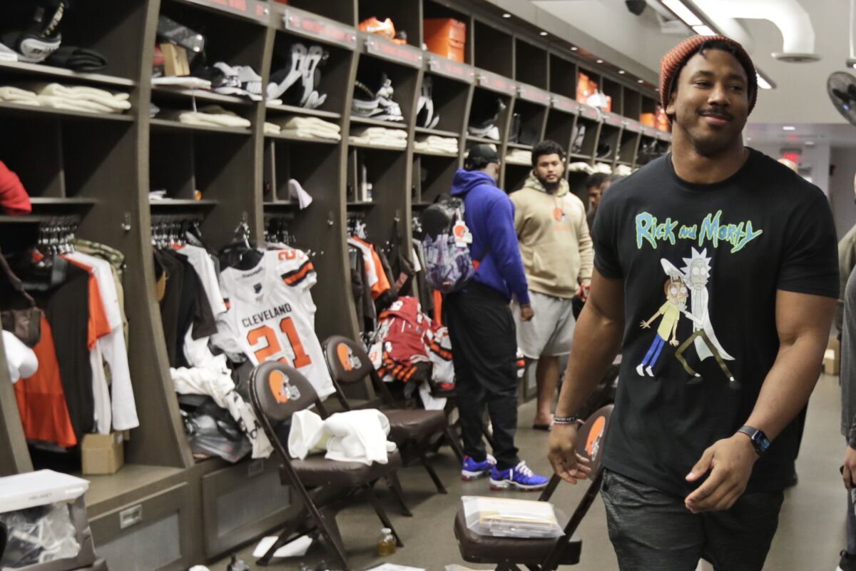 Cleveland Browns defensive end Myles Garrett walks through the locker room at the team's training facility in Berea, Ohio.