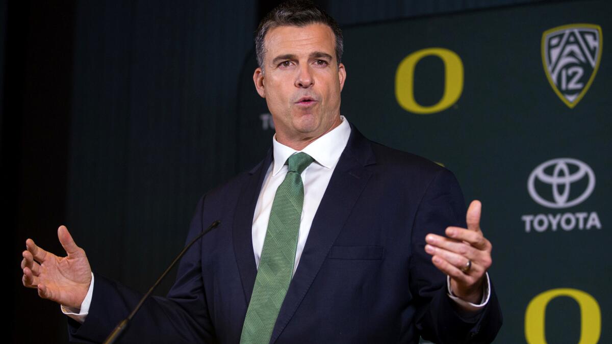 Mario Cristobal addresses the media after being introduced as Oregon's new football coach on Friday.