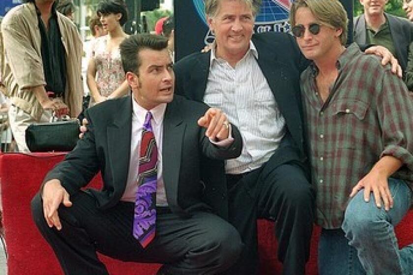 Martin Sheen's youngest son is as famous off-camera for his vocal opinions, hard-partying lifestyle and subsequent crashes and burns as he is for his acting. Somewhere in there, he managed to work in a decent movie career in the 1980s and 1990s, a couple of big TV credits and a star on the Hollywood Walk of Fame. (He's pictured here receiving it in 1994 with dad Martin, center, and brother Emilio Estevez.). Here's a look at some of the roles and scandals that helped make Charlie Sheen famous.