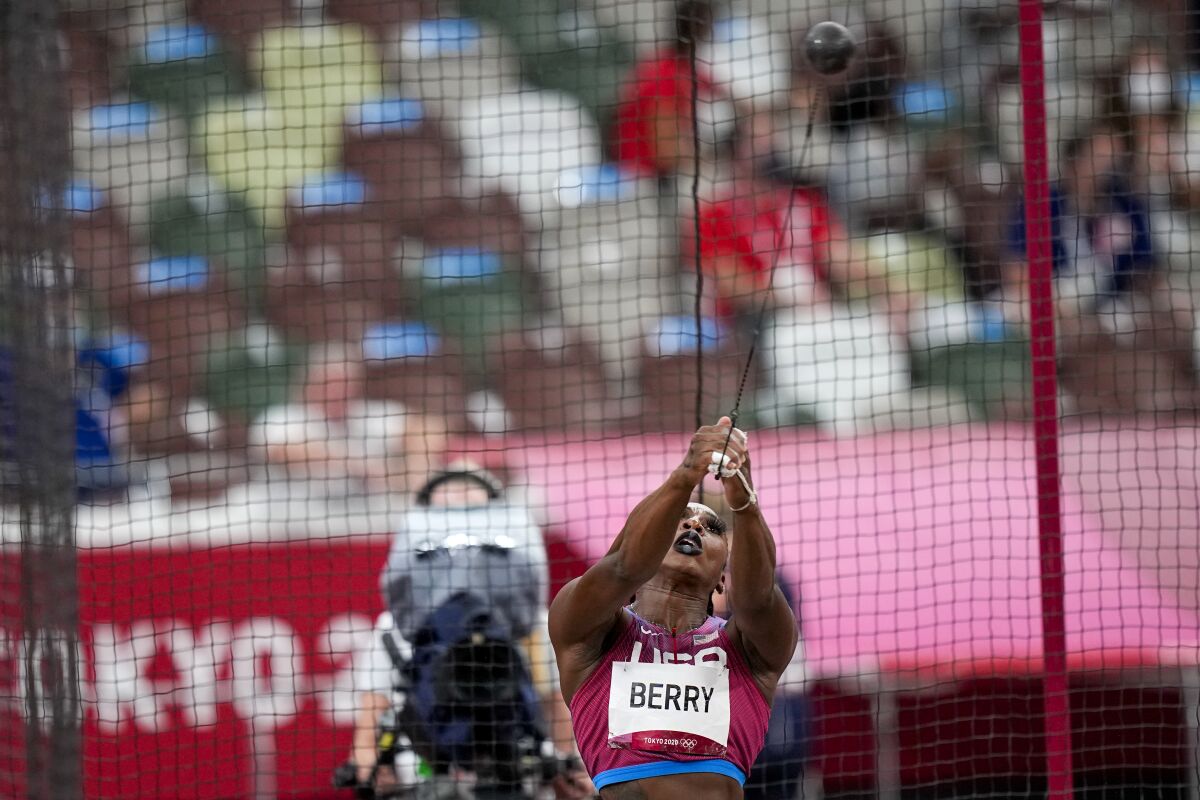 Gwen Berry, of the United States, competes in the women's hammer throw final at the 2020 Summer Olympics, Tuesday, Aug. 3, 2021, in Tokyo. (AP Photo/David J. Phillip)