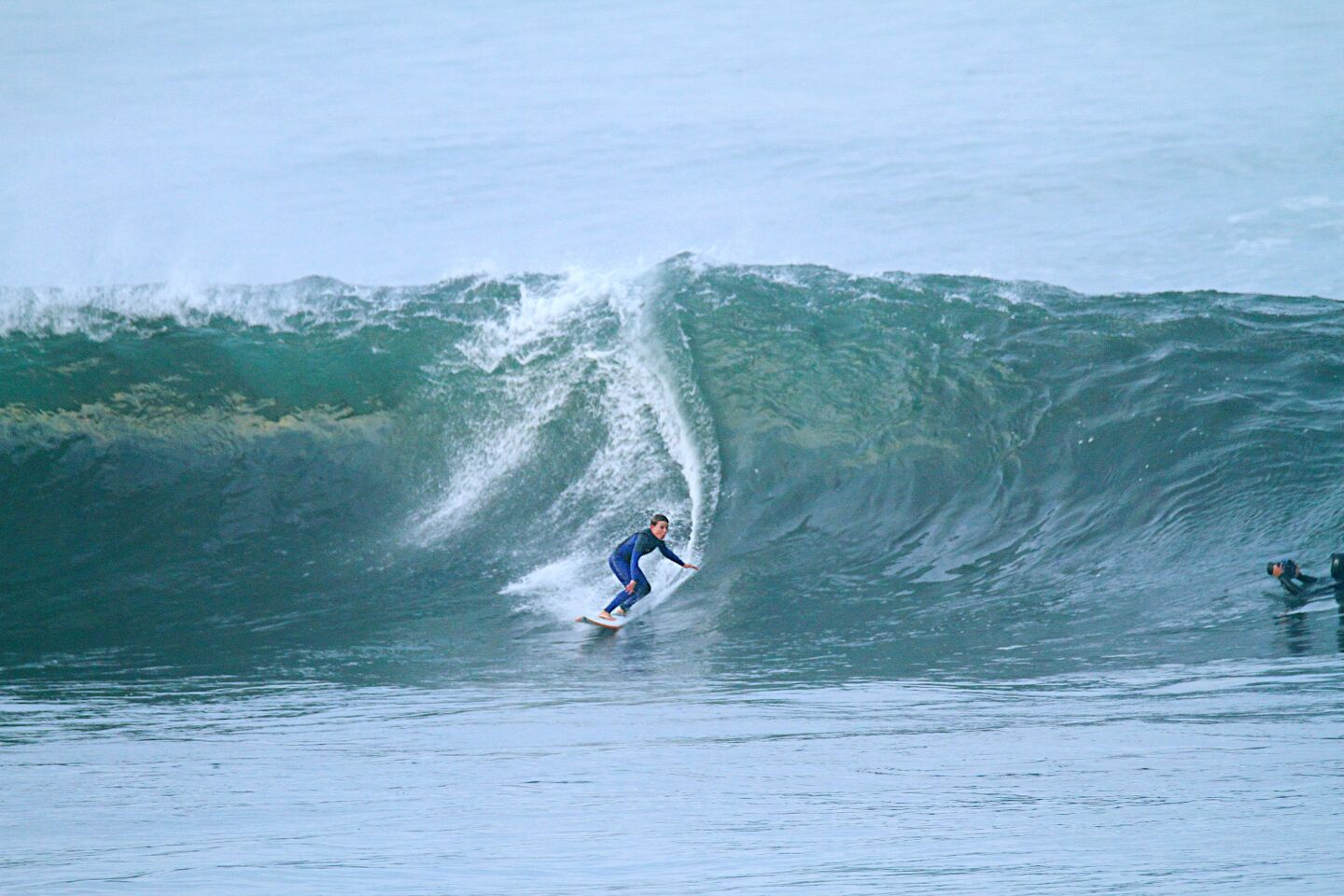 La Jolla resident Cortez Jernigan, 10, surfs a swell at Big Rock.
