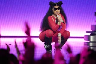 FILE - Nicki Minaj performs during the MTV Video Music Awards, at the Prudential Center in Newark, N.J.