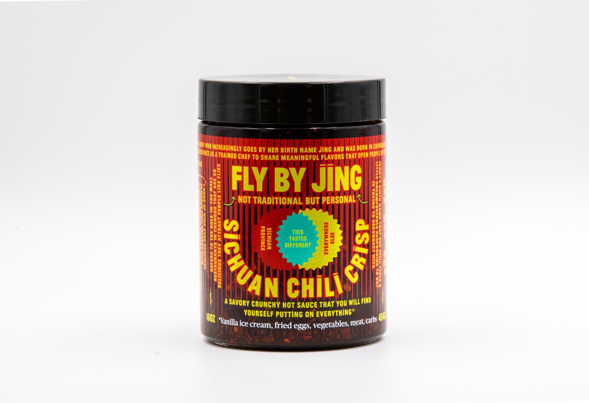 A jar of Jing Gao's Fly by Jing Sichuan Chili Crisp.