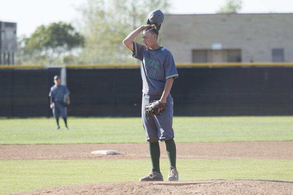 Costa Mesa High pitcher Skylar Manning reacts to a play during a 2-1 loss to Estancia.