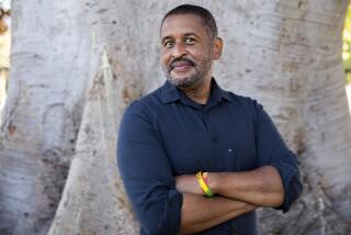 Los Angeles, CA - August 19 Shawn Griffin sits for portraits at De Longpre Park on Friday, Aug. 19, 2022 in Los Angeles, CA. (Brian van der Brug / Los Angeles Times)