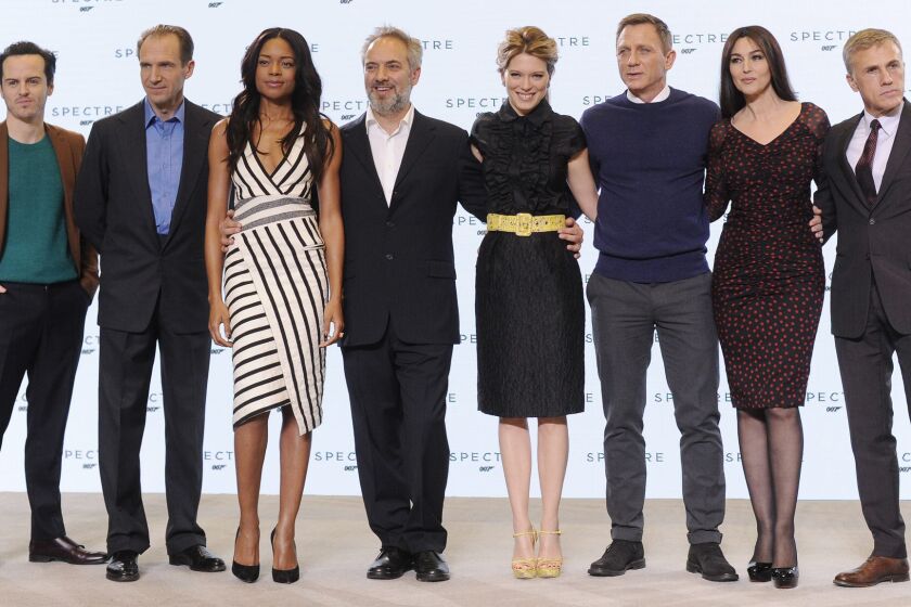 Cast and crew members unveil the next James Bond Film, "Spectre" at Pinewood Studios in Britain.