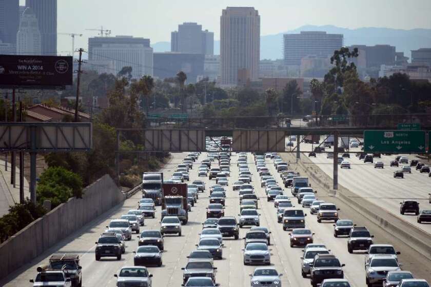(FILES) This August 30, 2013 file photo shows motorists as they make their way out of downtown Los Angeles, California. Delaying efforts to reduce greenhouse gas emissions could cost the US $150 billion per year, the White House warned on July 29, 2014 in a report on the economic consequences of inaction on climate change. "Although delaying action can reduce costs in the short run, on net, delaying action to limit the effects of climate change is costly, " the report said. "A delay that results in warming of 3 degrees C (5.4 degrees F) above preindustrial levels, instead of 2 degrees, could increase economic damages by approximately 0.9 percent of global output, " the report said. In 2009, US President Barack Obama pledged to reduce the country's greenhouse gas emissions by 17 percent by 2020 compared to 2005 levels.