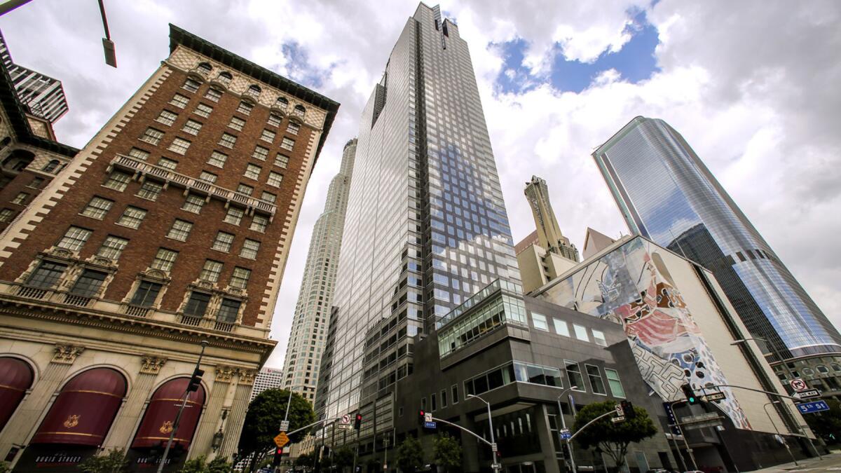 Several tall buildings are shown in downtown Los Angeles. 