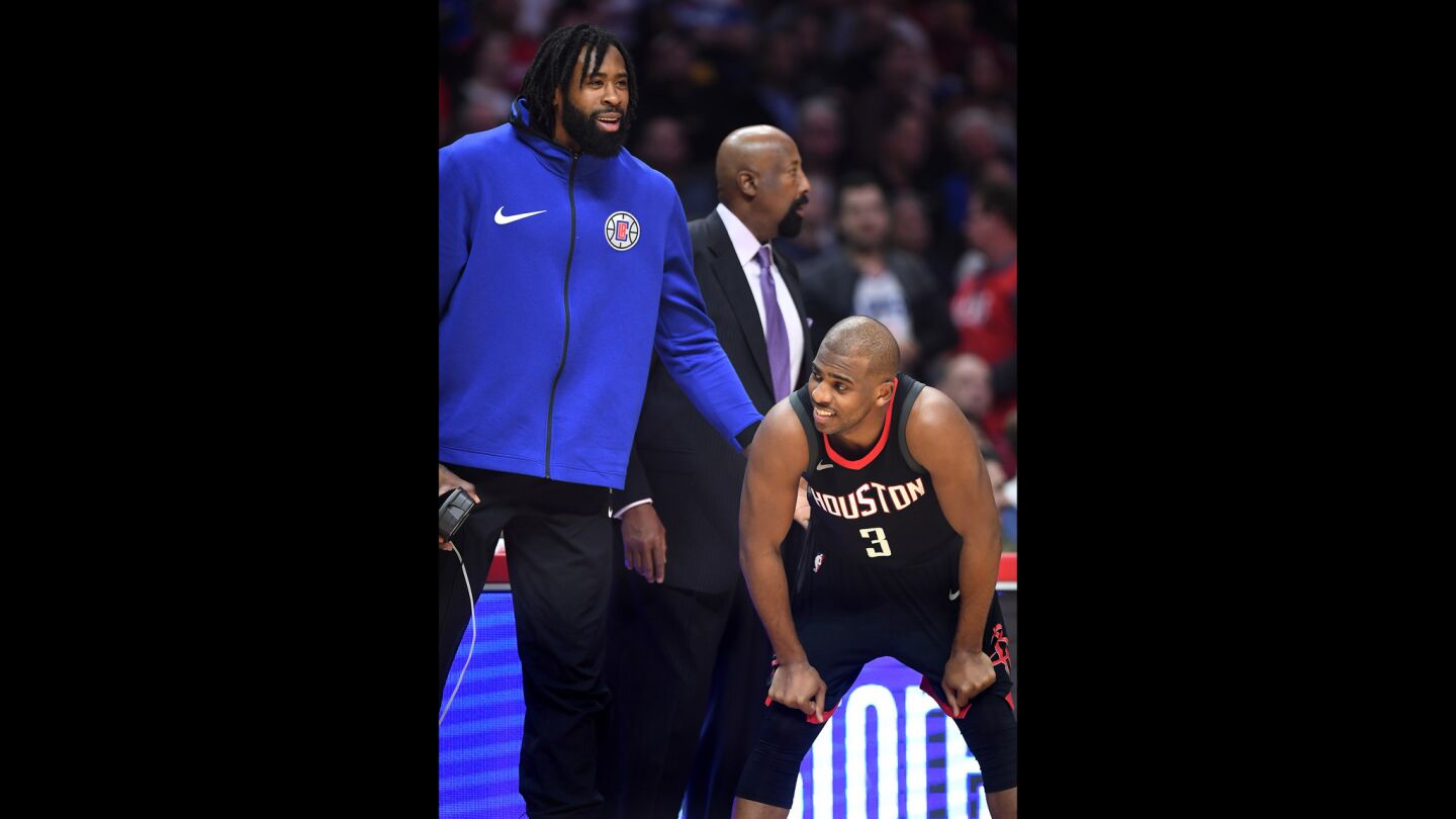 Clippers' DeAndre jordan and Houston Rockets' Chris Paul share a laugh.