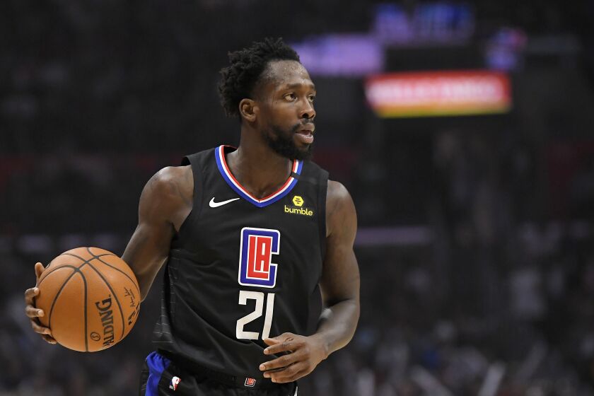 Los Angeles Clippers guard Patrick Beverley dribbles during the second half.