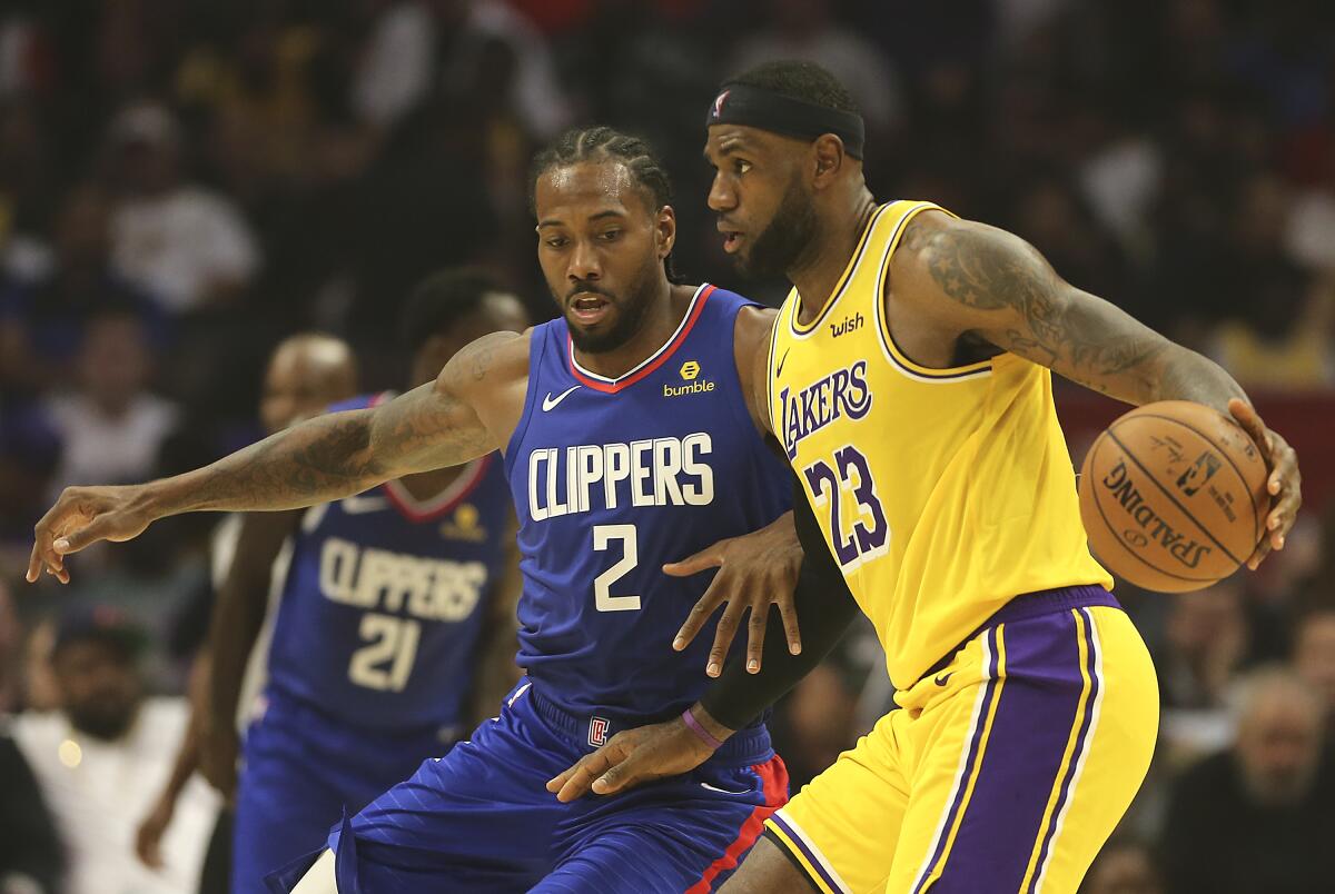 Clippers' Kawhi Leonard and Lakers' LeBron James are two of 44 finalists for the U.S. Olympic team.