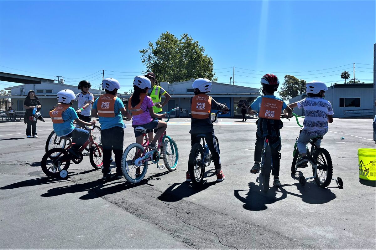 Kids learn bike safety at a Wilson Elementary School event in 2022.