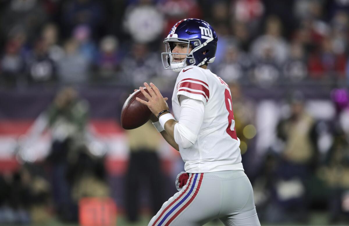 New York Giants quarterback Daniel Jones drops back to pass against the New England Patriots in the first half on Oct. 10 in Foxborough, Mass.