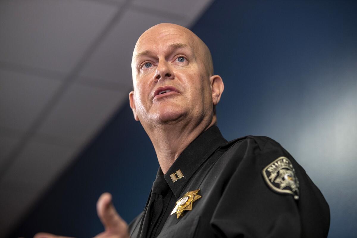 Capt. Jay Baker speaks at a news conference