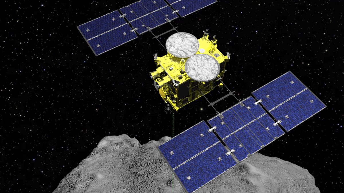 FILE - This computer graphics image released by the Japan Aerospace Exploration Agency (JAXA) shows the Hayabusa2 spacecraft above the asteroid Ryugu. The Japanese space agency said Friday they are all set for the spacecraft′s final approach to Earth this weekend to deliver a capsule containing valuable samples of a distant asteroid that could provide clues to the origin of the solar system. (ISAS/JAXA via AP, File)