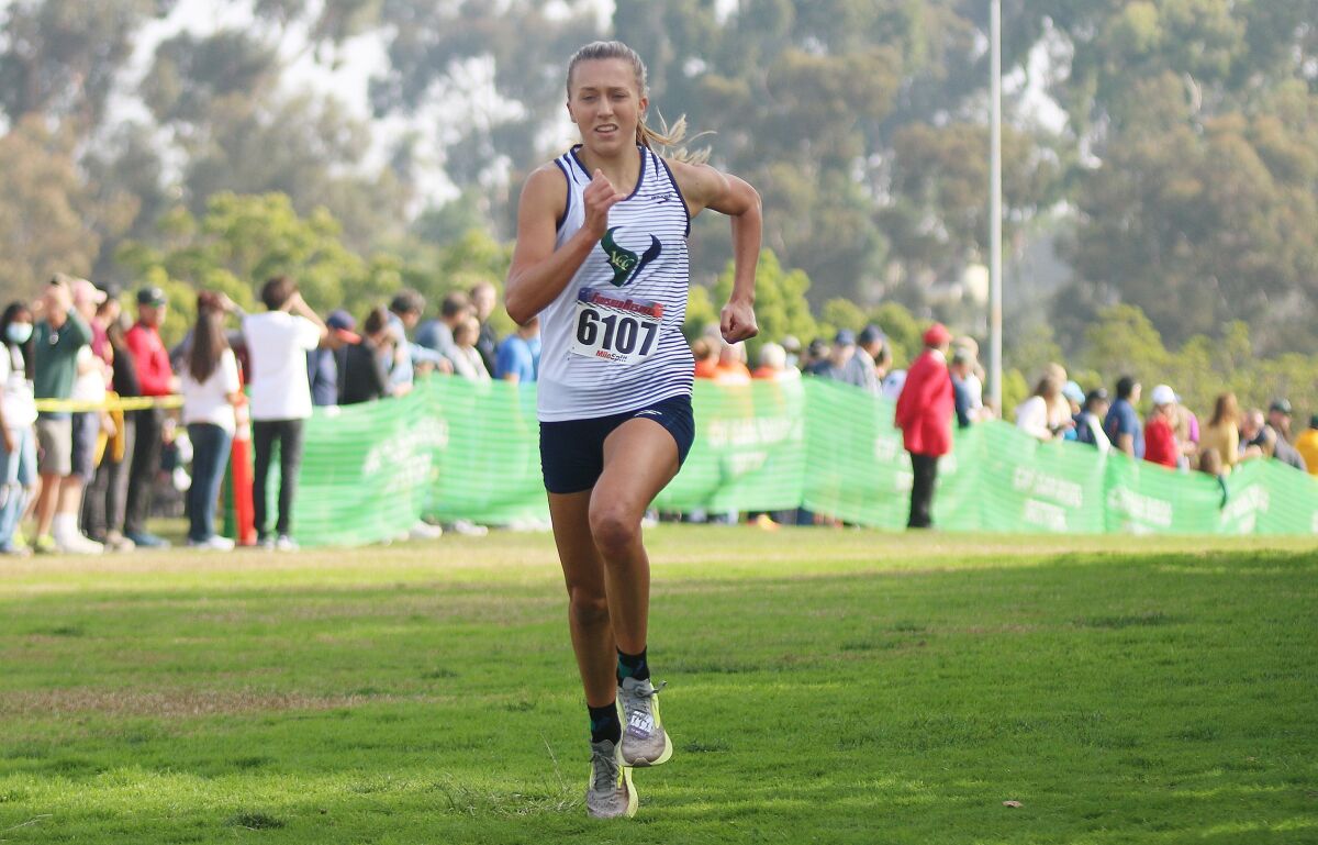 Senior Kyra Compton of LCC steams toward a second place finish in the D-3 girls race.