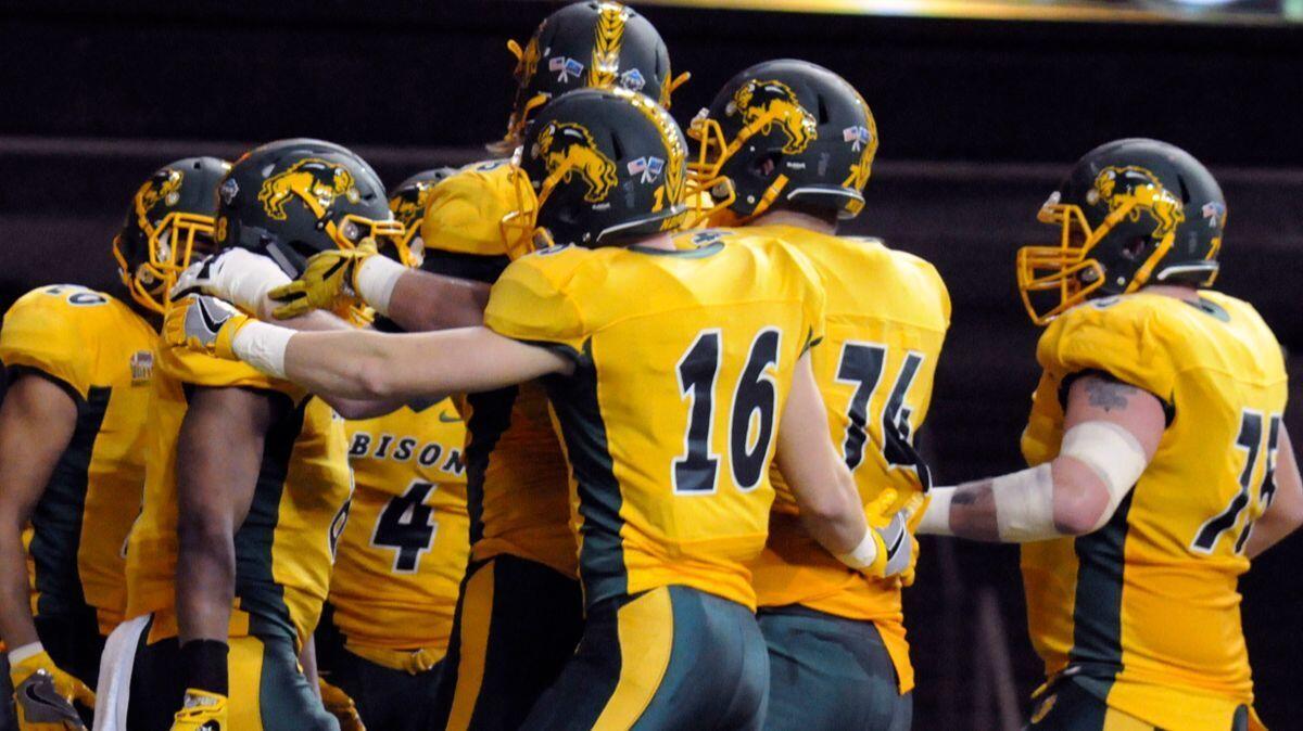 North Dakota State players celebrate a touchdown during a game against Sam Houston State on Dec. 15, 2017.